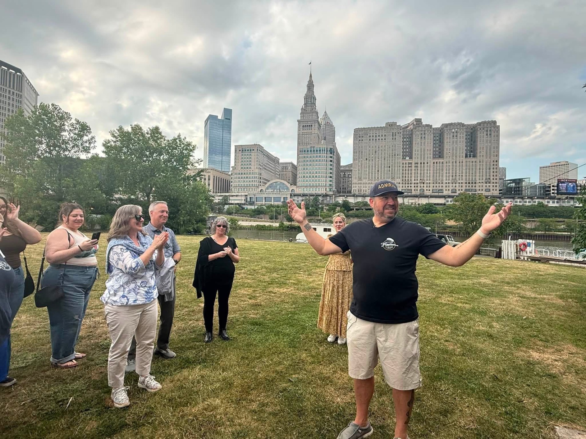 Admiral Jim addressing a group outdoors in Cleveland